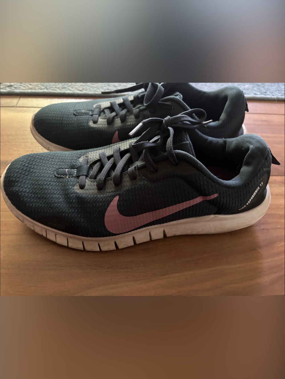 Nike Women’s Green Athletic Shoes with Purple Swoosh